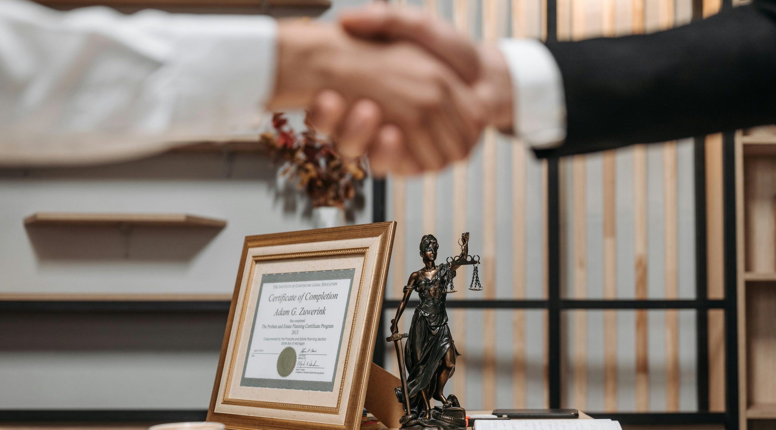 Business and Investment Visa Services | Beyond Horizons Australia Handshake in office representing business and investment visa opportunities in Australia.